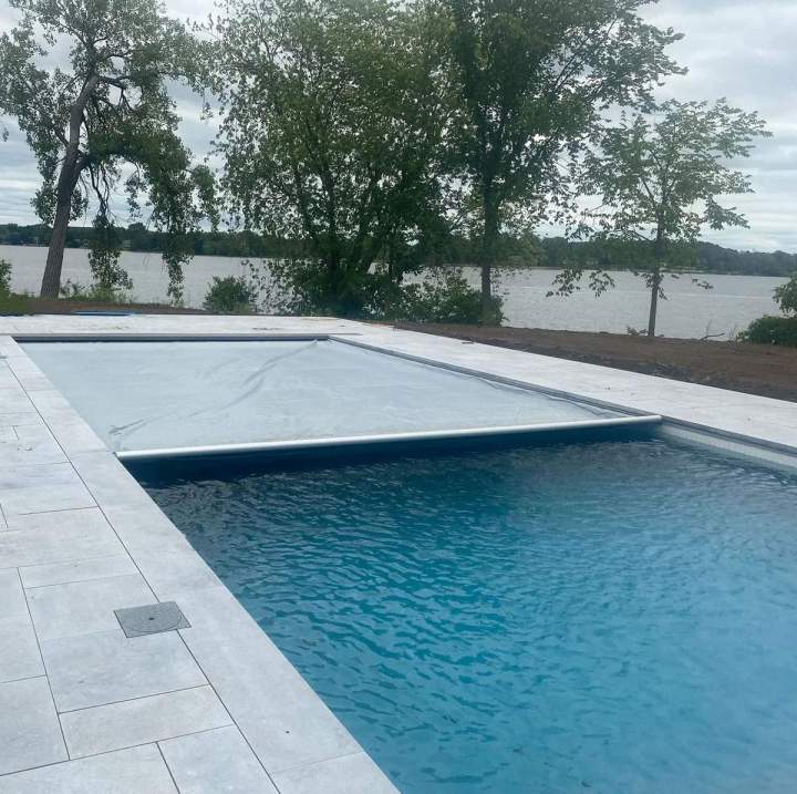 Keep Your Pool Clean and Secure with Our Retractable Covers.