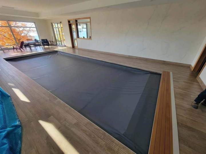Installation de bâche de piscine Montréal